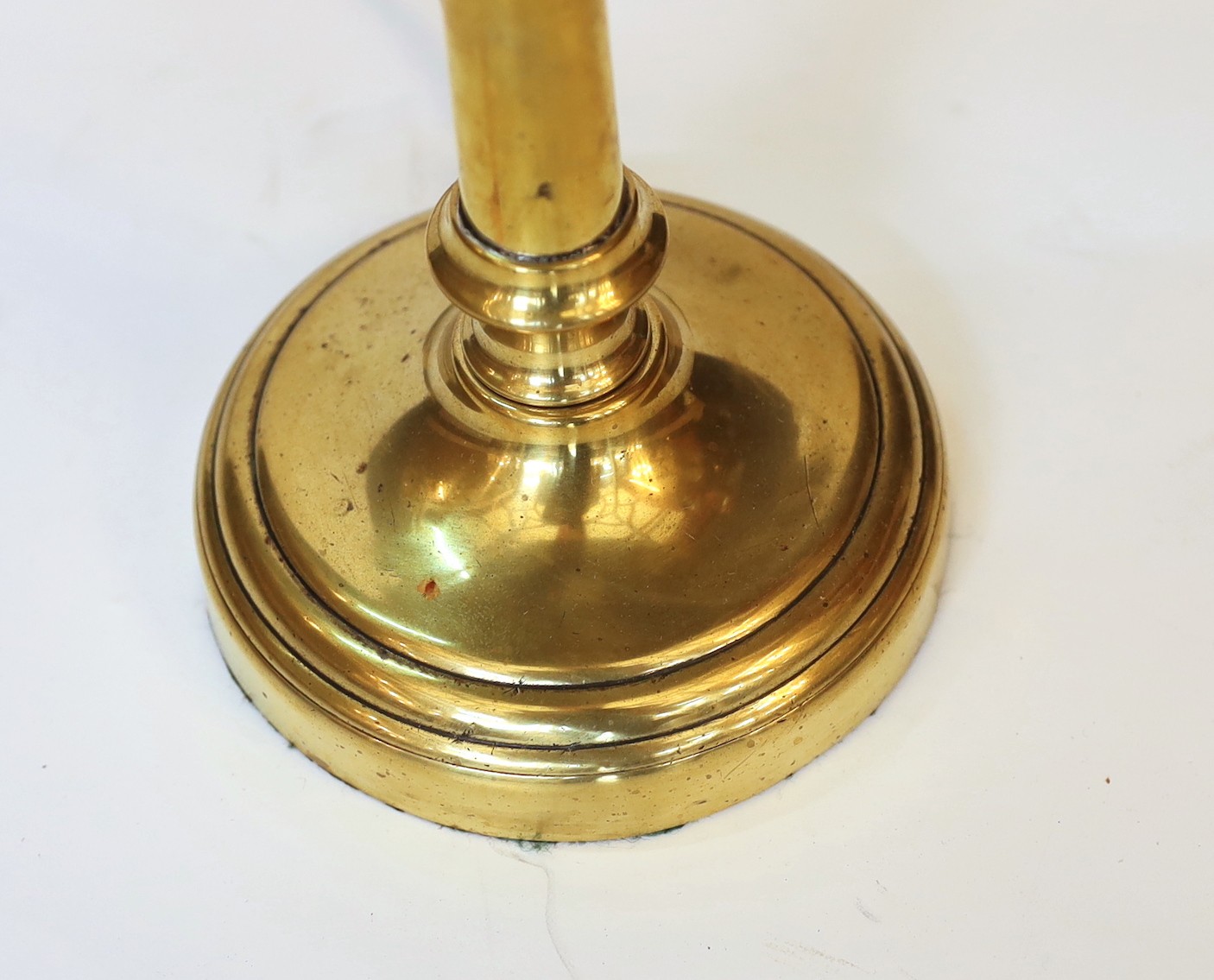 An early 20th century English brass table lamp, the jewelled shade with glass bead fringe, height 45cm
